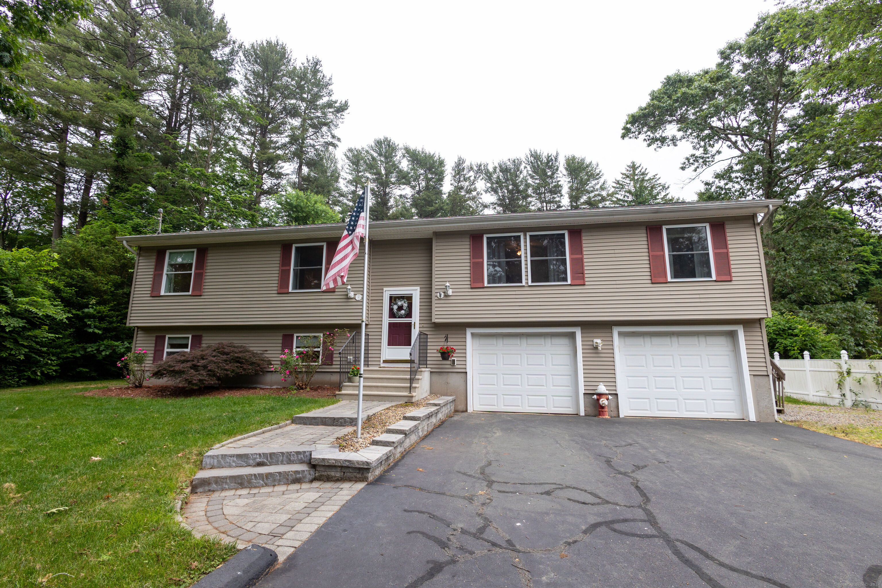 25 Pinnacle Road Ellington, CT 06029 - Photo 1 of 1 a front view of a house with a yard