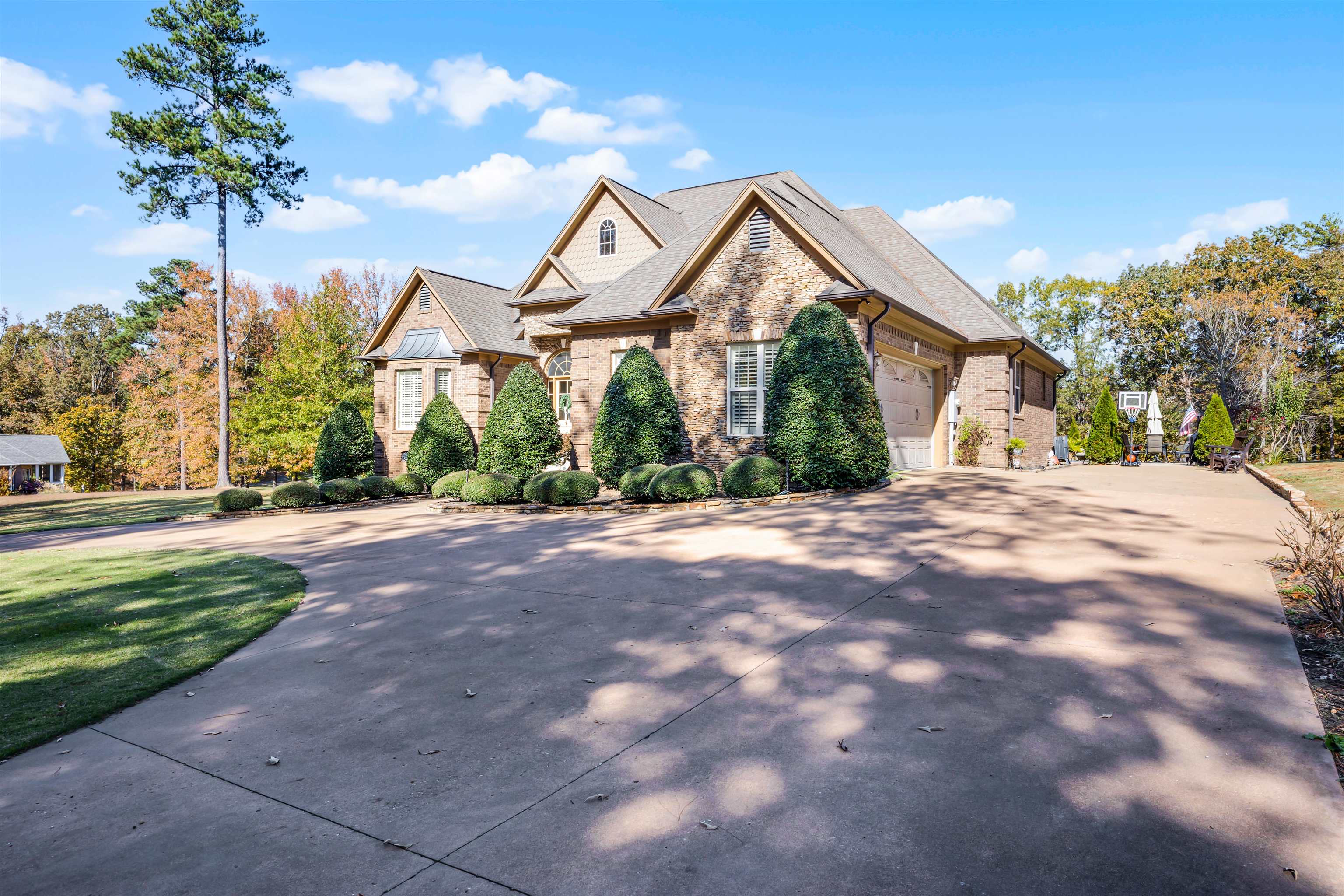 140 Legends Drive Counce, TN 38326 - Photo 2 of 30 a view of a house with a yard and potted plants