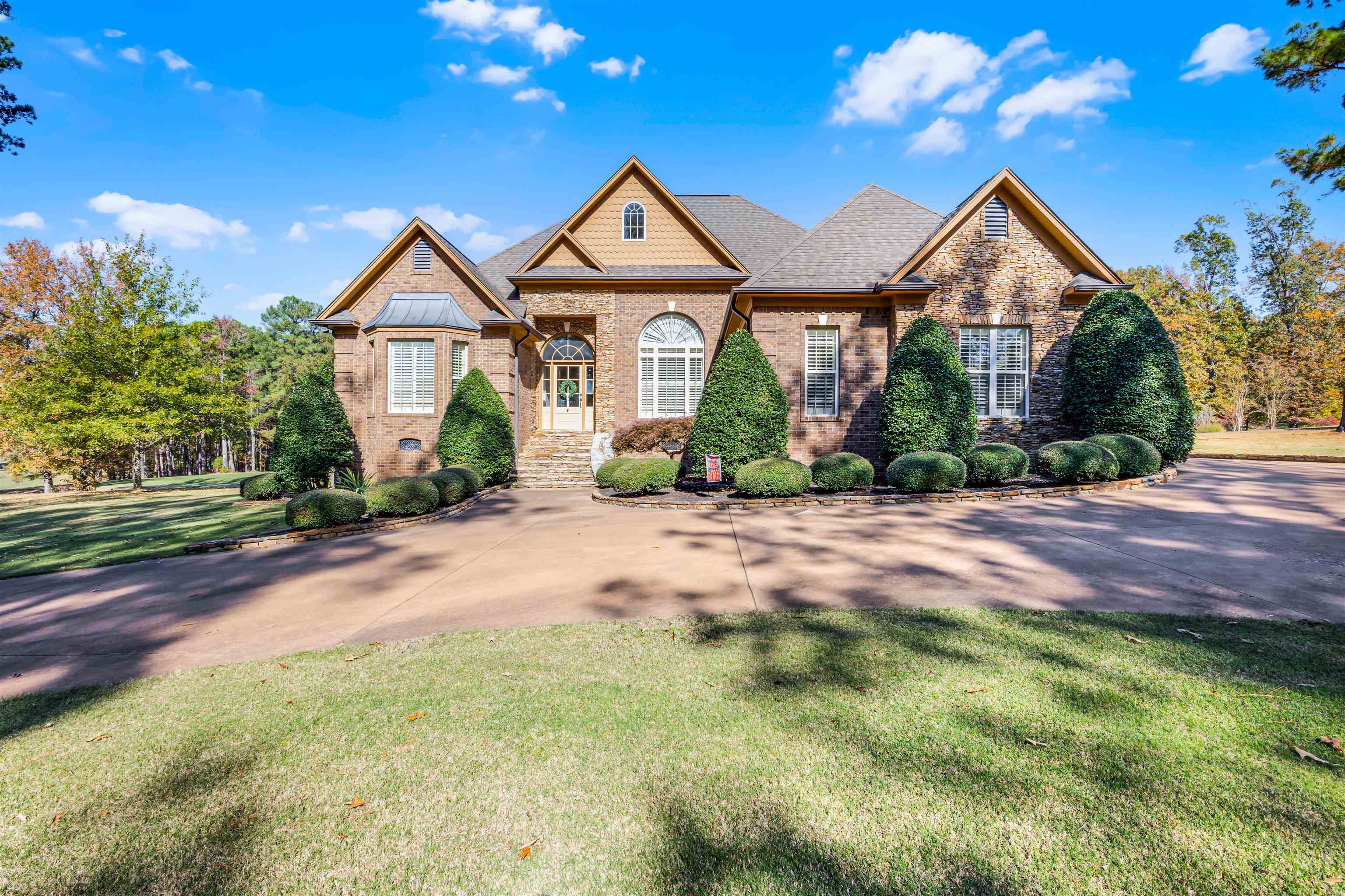 140 Legends Drive Counce, TN 38326 - Photo 30 of 30 a front view of a house with a yard