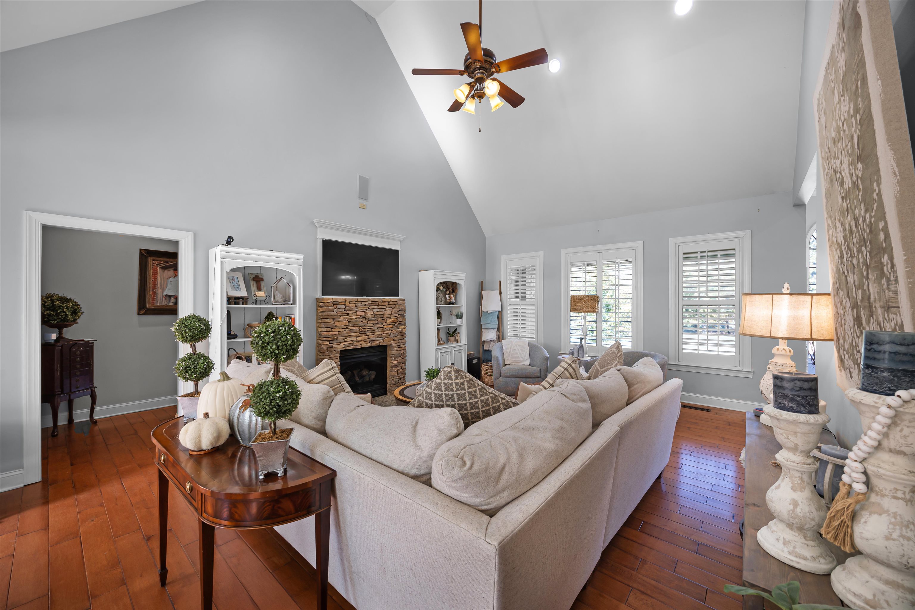 140 Legends Drive Counce, TN 38326 - Photo 7 of 30 a living room with fireplace furniture and a wooden floor