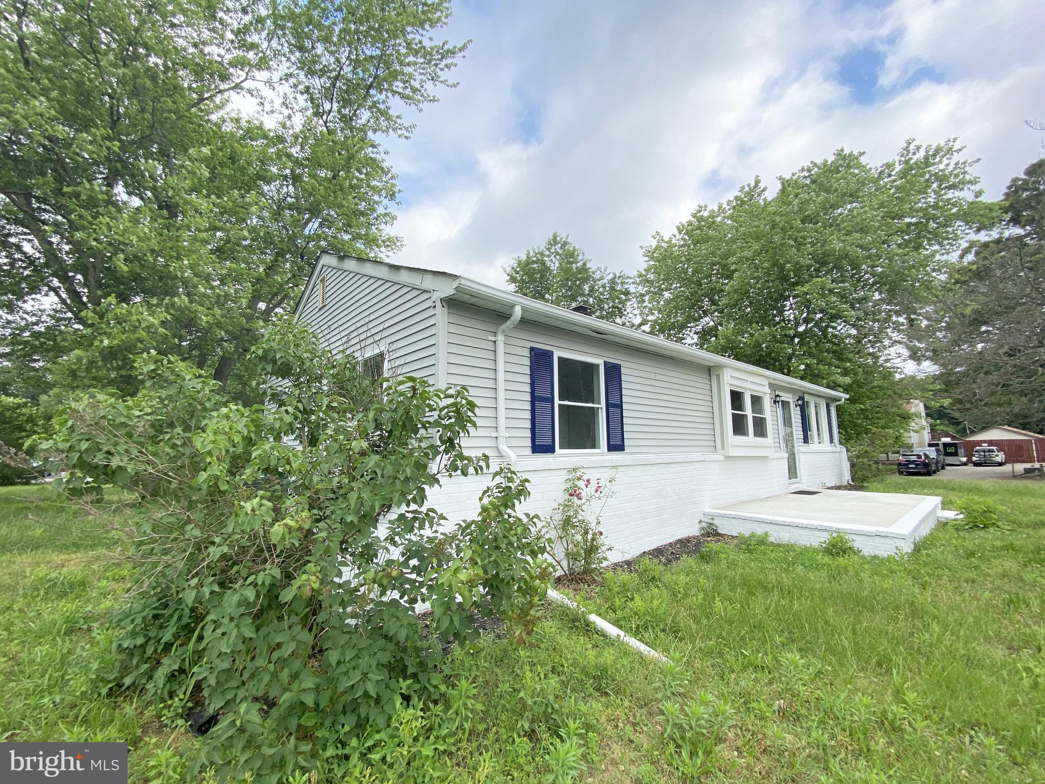 8360 Lockwood Road Pasadena, MD 21122 - Photo 14 of 44 Left Side Front