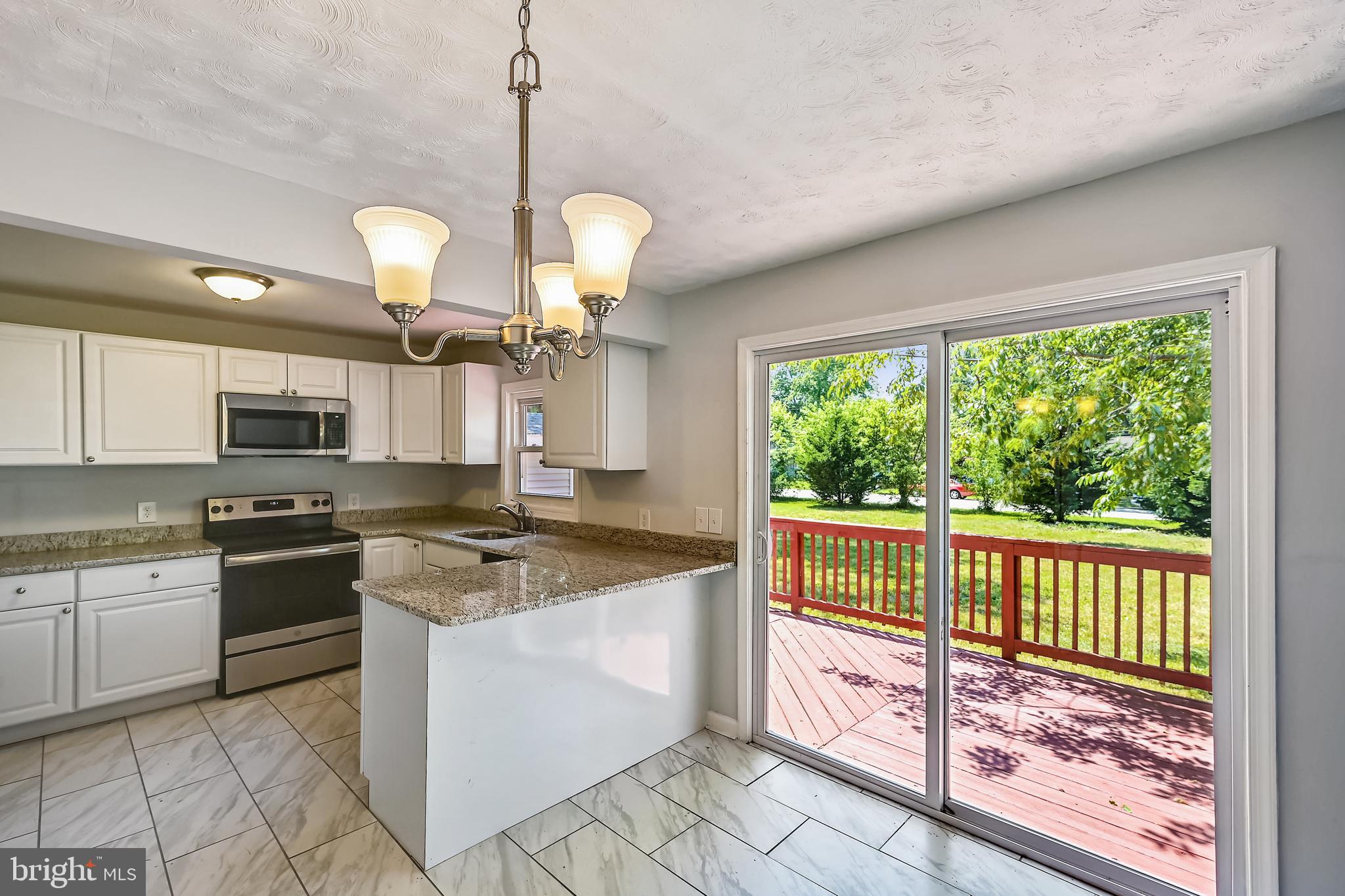 8360 Lockwood Road Pasadena, MD 21122 - Photo 23 of 44 Dining room view to kitchen