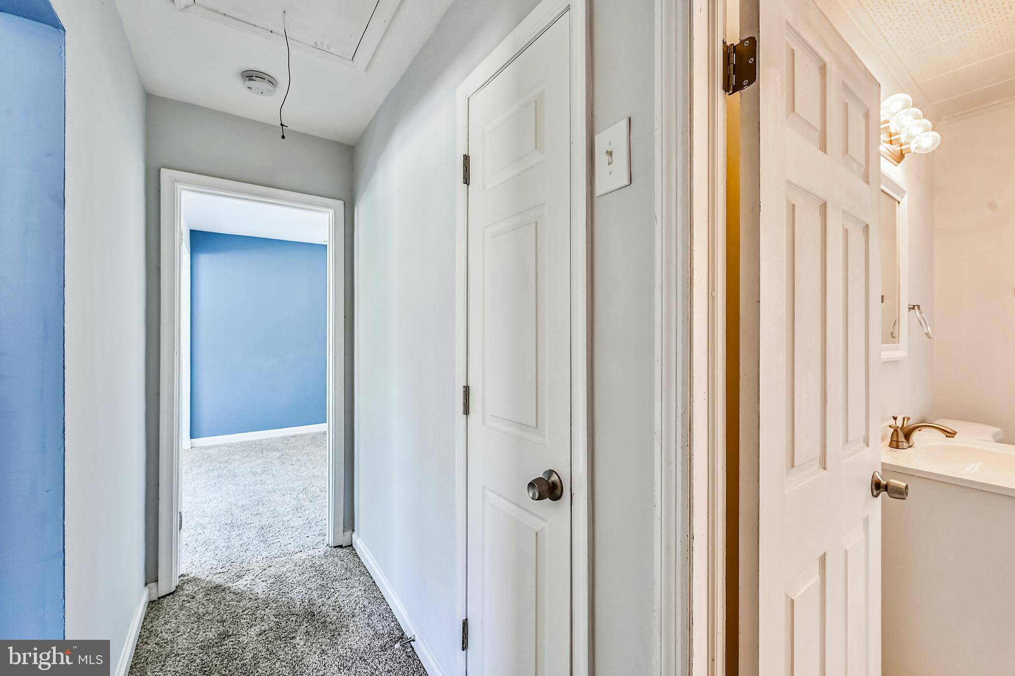 8360 Lockwood Road Pasadena, MD 21122 - Photo 29 of 44 Hall to master and full bath