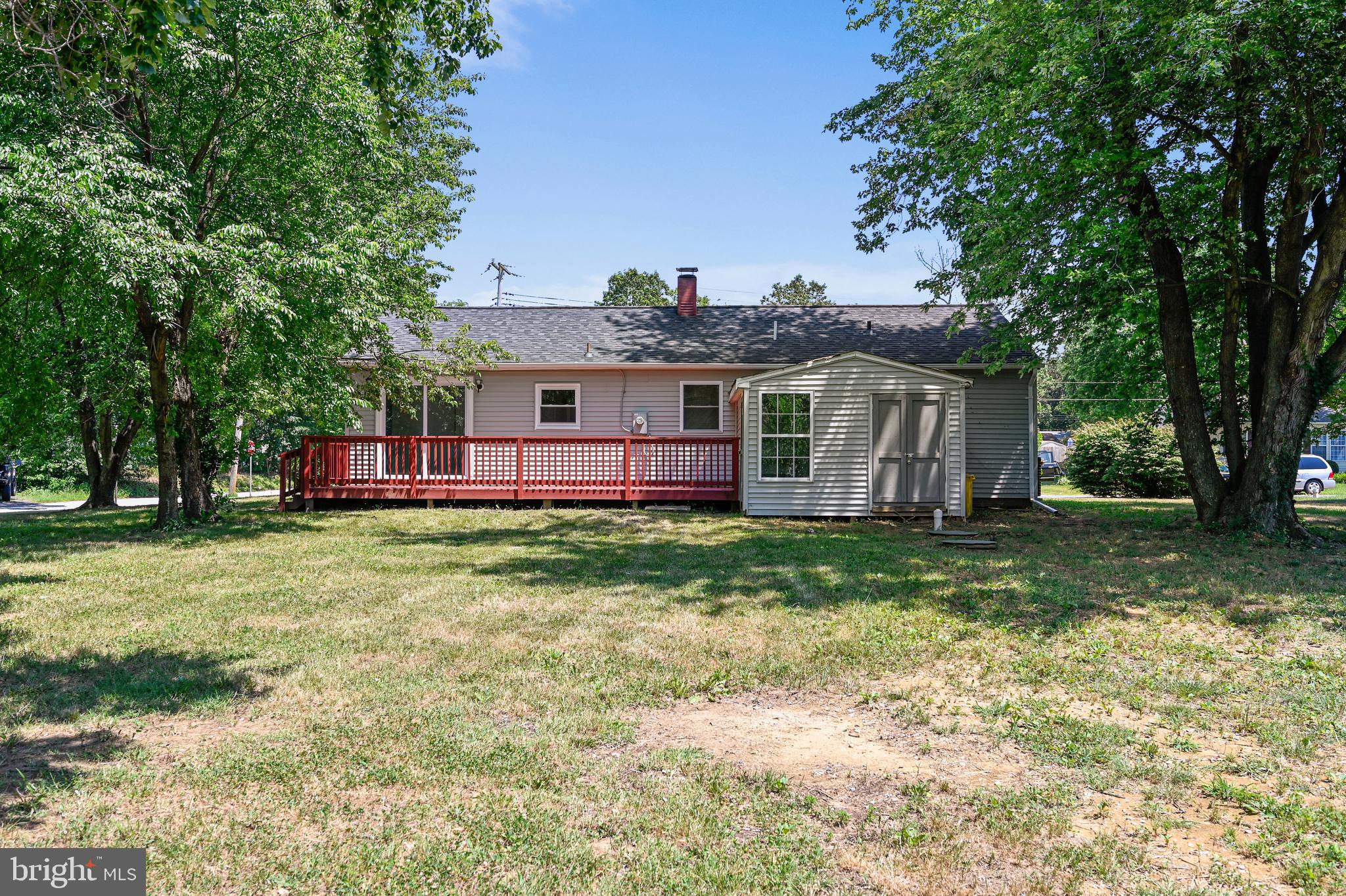 8360 Lockwood Road Pasadena, MD 21122 - Photo 7 of 44 Back of house, deck and shed