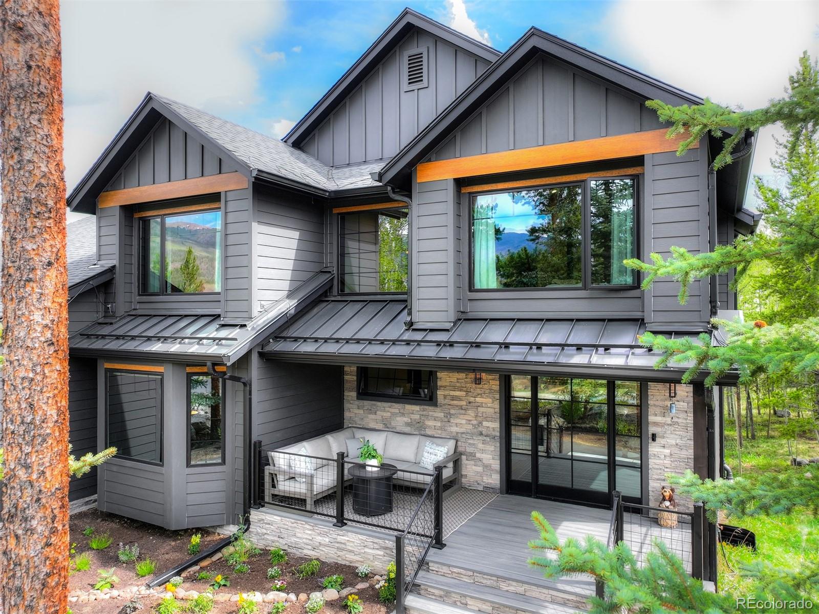 306 Golden Eagle Road Silverthorne, CO 80498 - Photo 2 of 43 a front view of a house with garage