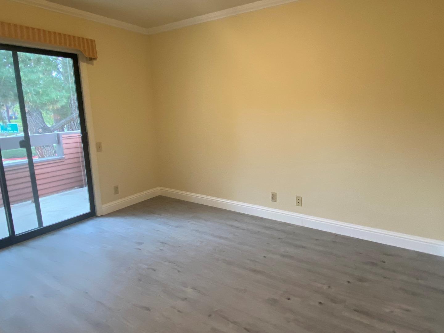 910 Wharfside Road San Mateo, CA 94404 - Photo 10 of 14 a view of an empty room with a window