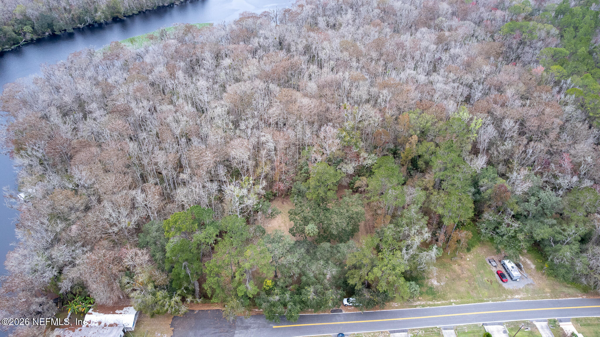 155 Fran Lane Satsuma, FL 32189 - Photo 23 of 32 a view of a yard from a window