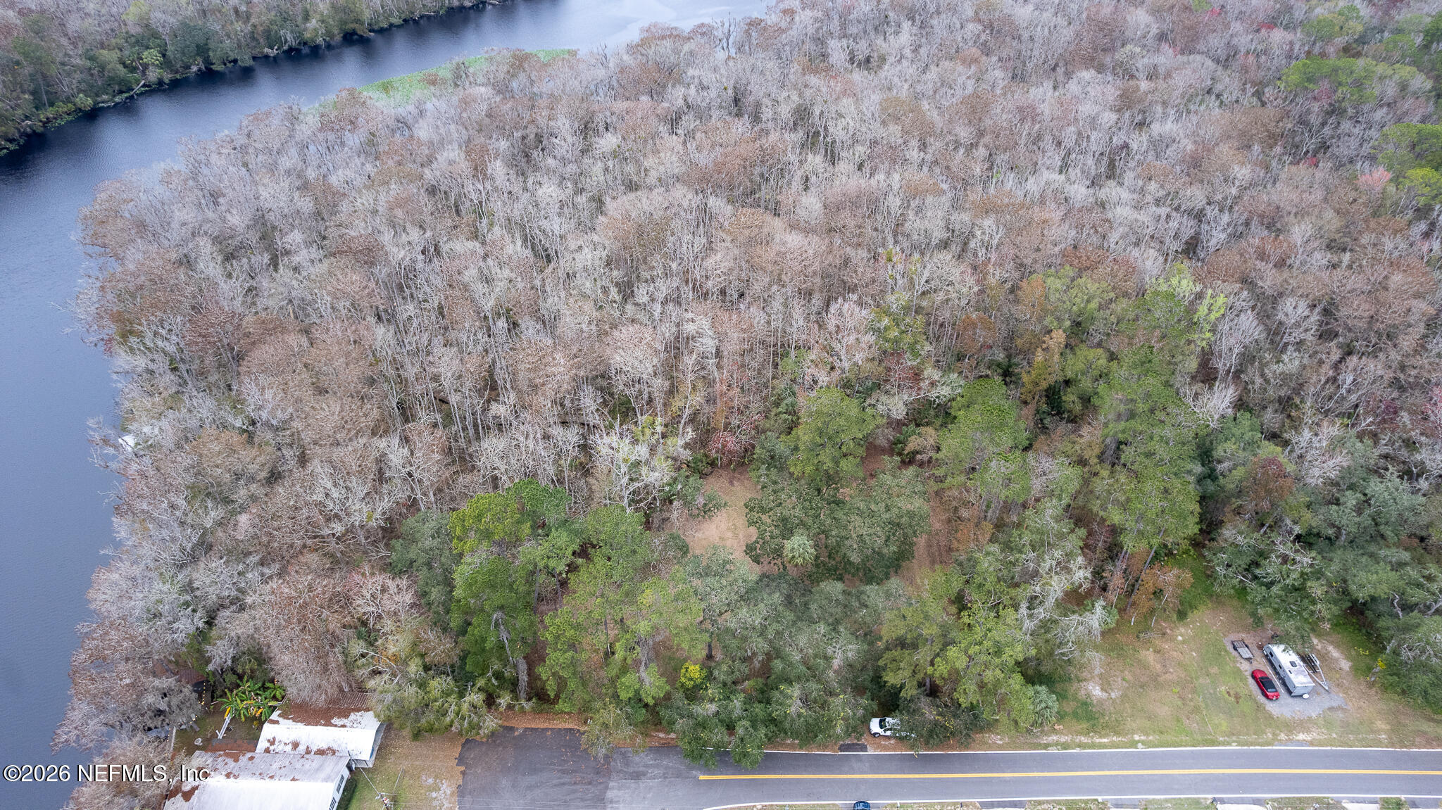 155 Fran Lane Satsuma, FL 32189 - Photo 24 of 32 a backyard of a house with lots of green space