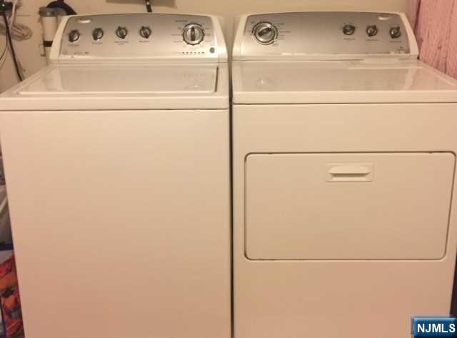 280-320 Oak Street, Unit 306TG Ridgewood, NJ 07450 - Photo 1 of 22 a close up view of a washer and dryer