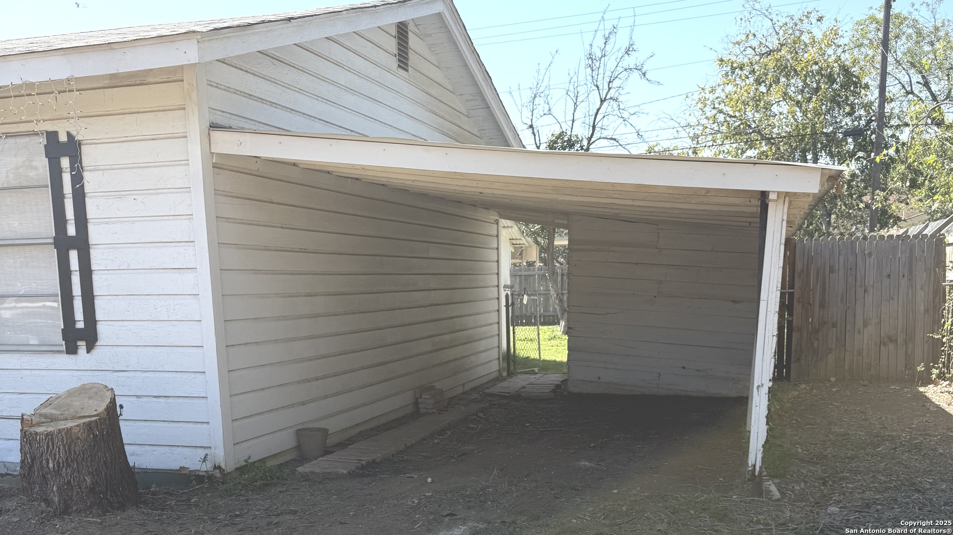 907 Dove Avenue Devine, TX 78016 - Photo 2 of 8 a view of a door of the house
