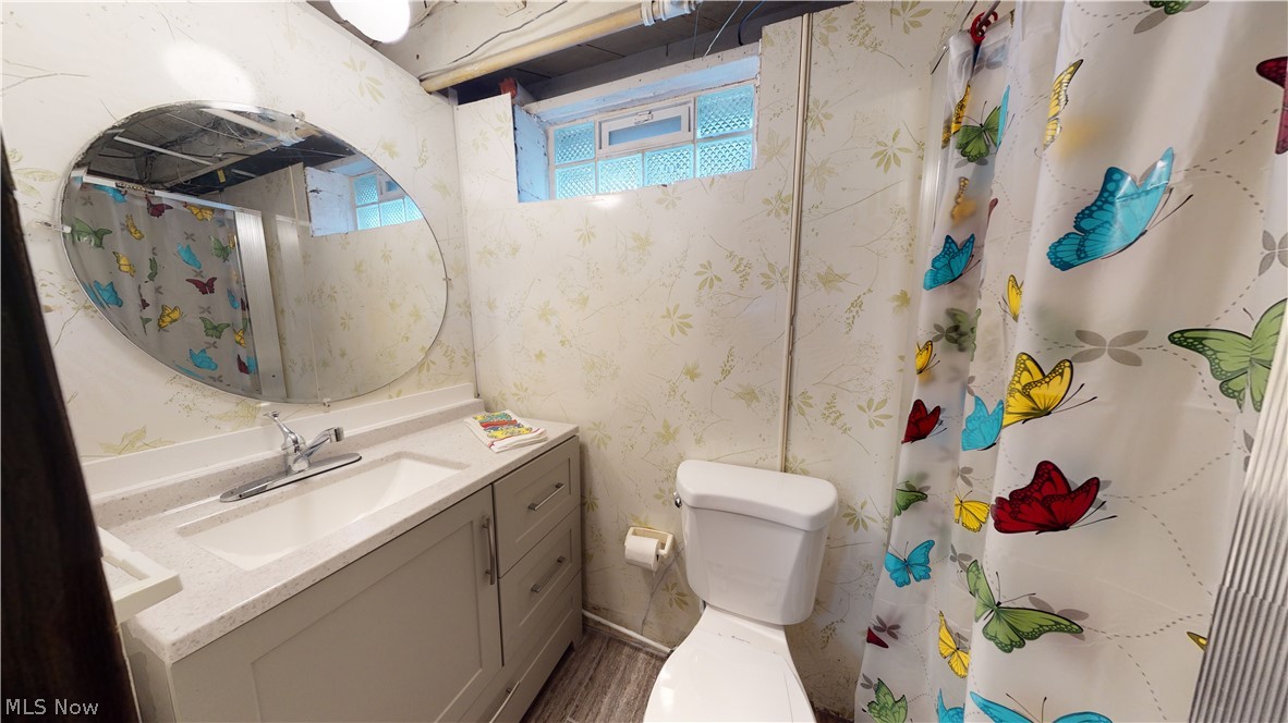 1600 Brainard Road Lyndhurst, OH 44124 - Photo 21 of 27 2nd full bathroom with New vanity! New toilet! New ceramic flooring! New lighting!