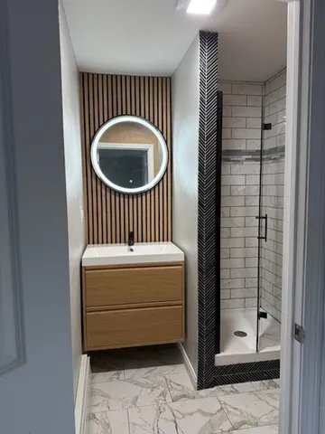 an empty room with wooden floor