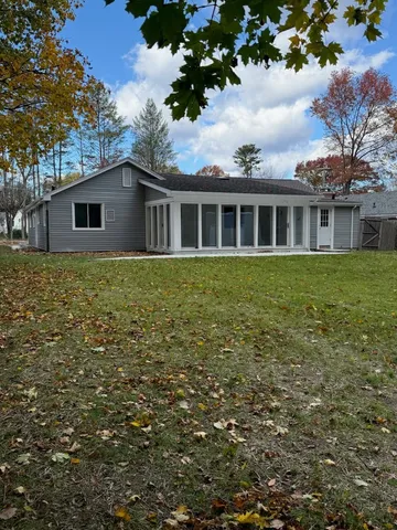 a house view with a garden space