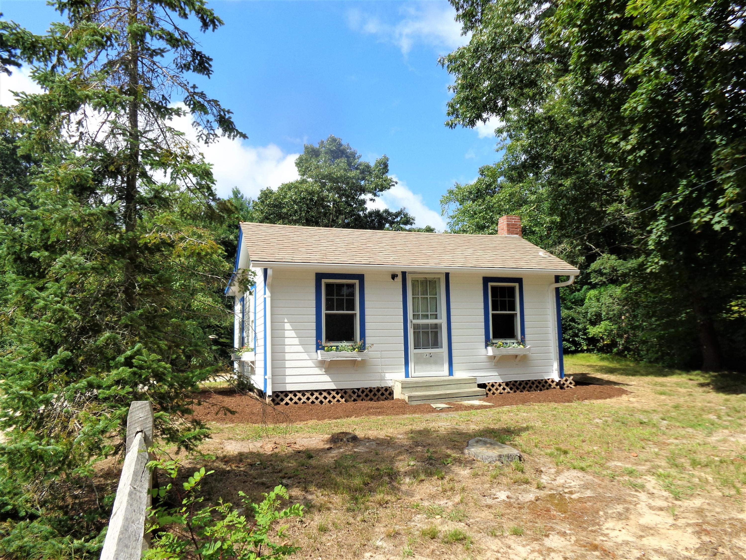 20 Baker Road, Unit C Wellfleet, MA 02667 - Photo 1 of 19 a view of a house with backyard and tree s
