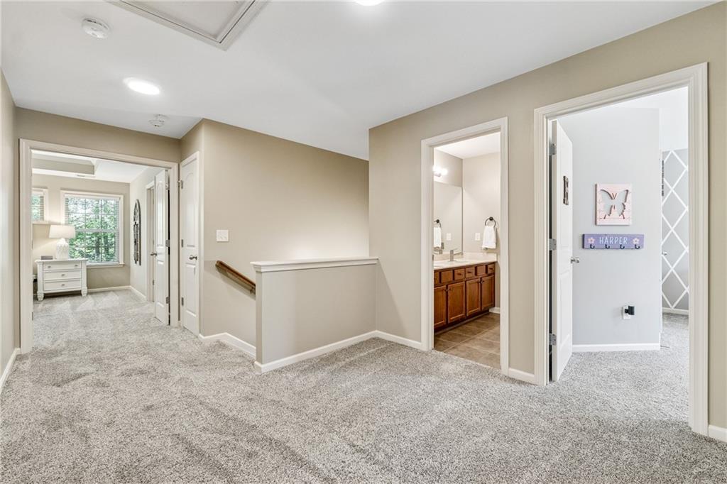 2770 Lansing Lane Cumming, GA 30041 - Photo 27 of 49 a view of a big room with closet and windows
