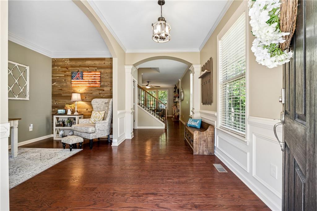 2770 Lansing Lane Cumming, GA 30041 - Photo 4 of 49 a view of an entryway with wooden floor