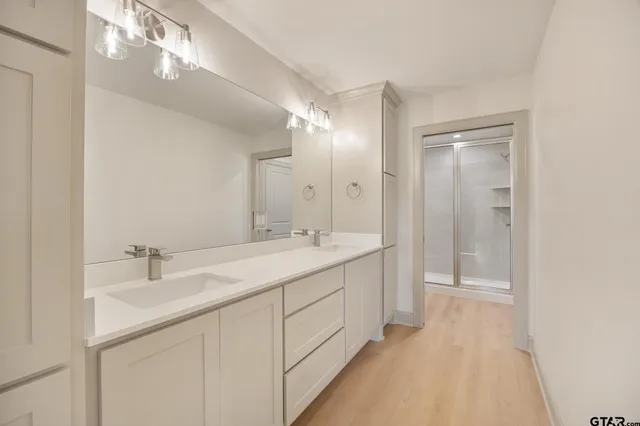 a bathroom with a shower and toilet