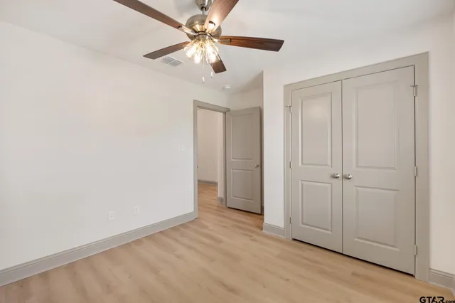 a bathroom with a sink toilet tub and shower