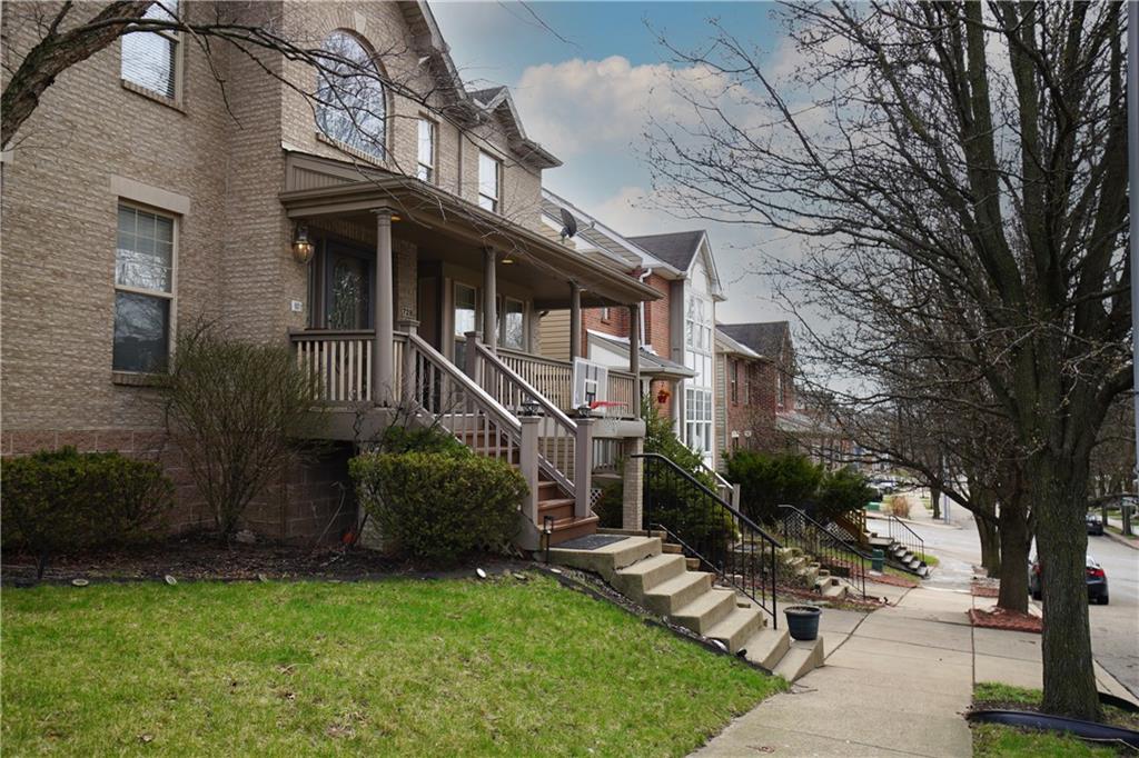 728 Mercer Street Pittsburgh, PA 15219 - Photo 26 of 27 a front view of a house with garden