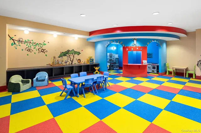 a view of tall building with a street