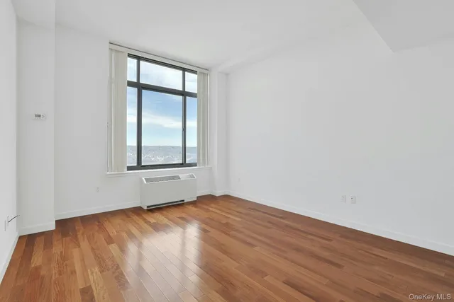 an empty room with window
