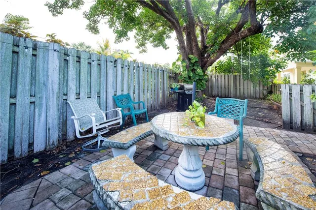 a view of an outdoor sitting area with furniture