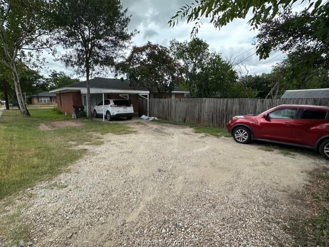313 Laurel Street Bryan, TX 77801 - Photo 15 of 16 a front view of a house with garden