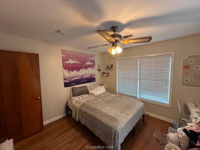 313 Laurel Street Bryan, TX 77801 - Photo 6 of 16 a bedroom with a bed and a window