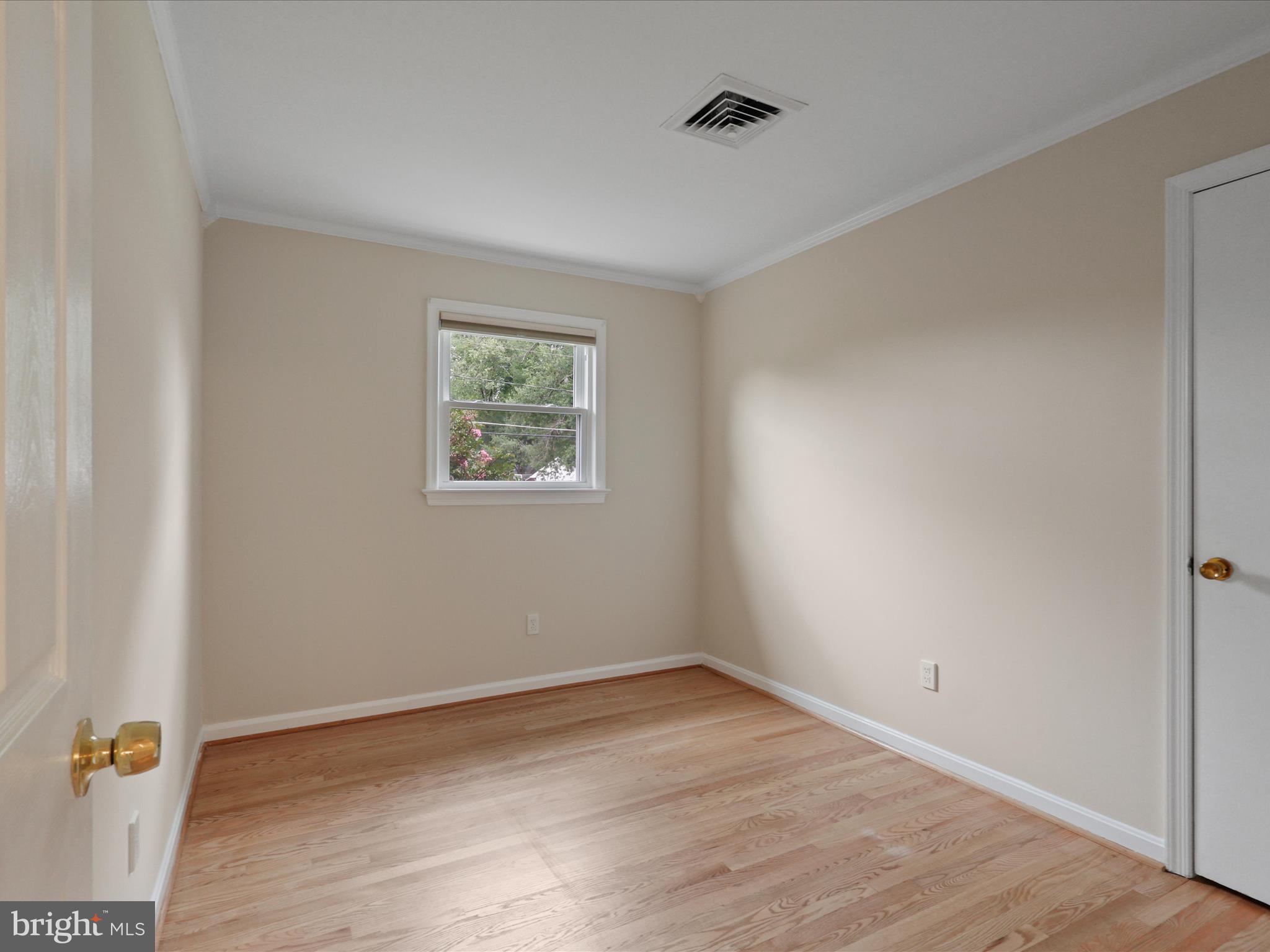 4417 Laurel Road Alexandria, VA 22309 - Photo 20 of 46 wooden floor in a empty room