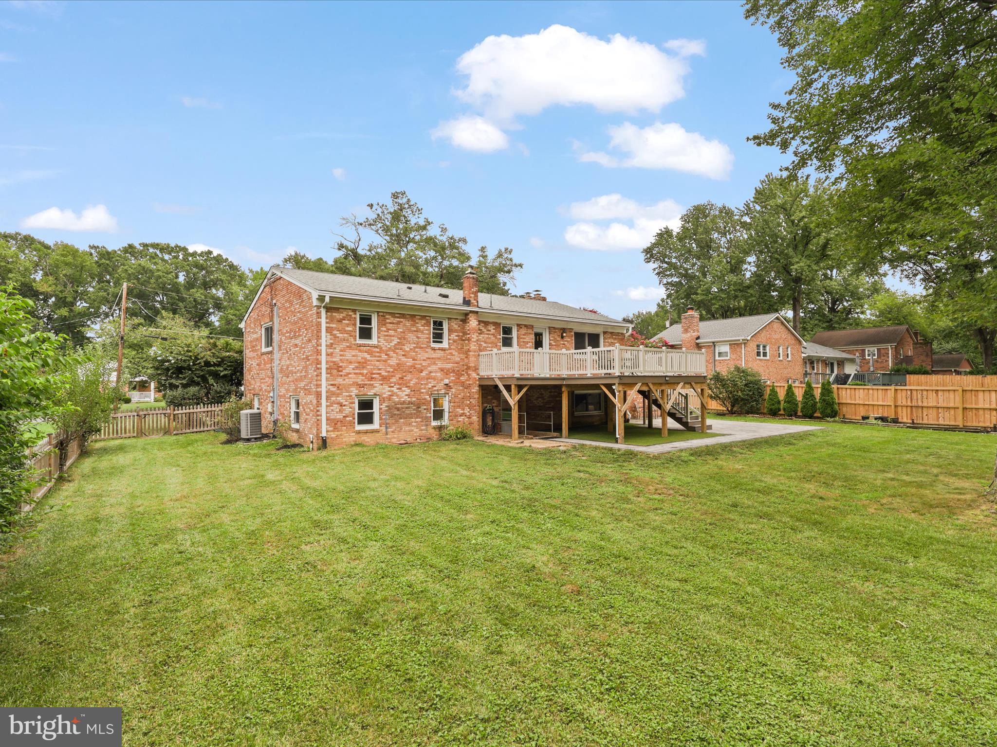 4417 Laurel Road Alexandria, VA 22309 - Photo 34 of 46 a front view of a house with a garden