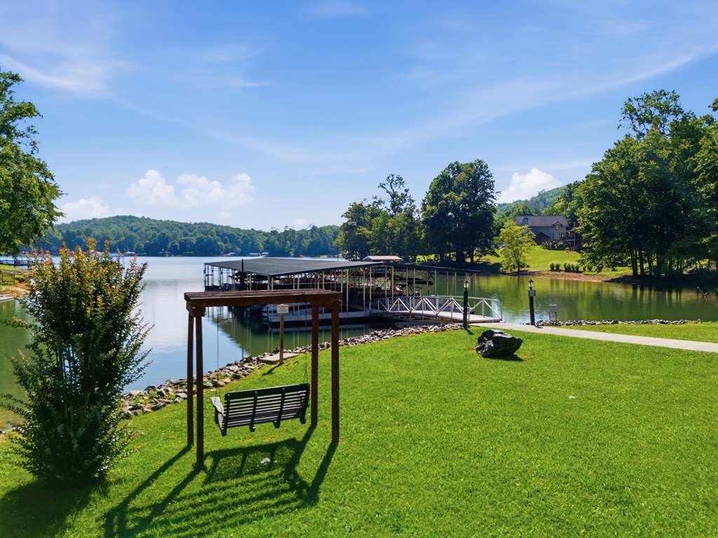 2143 Ridgecrest Circle, Unit 1 Hiawassee, GA 30546 - Photo 8 of 53 a view of backyard with swimming pool and green space