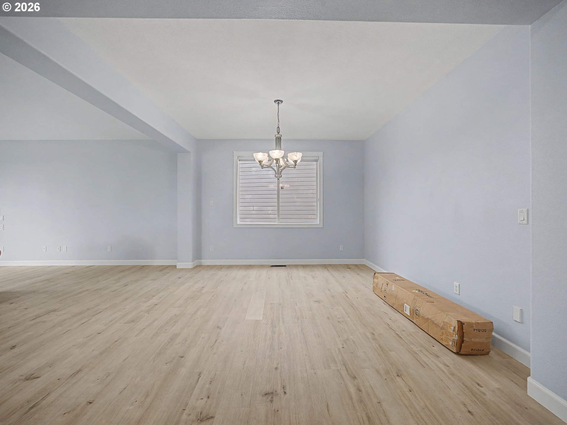 12410 Southwest Aspen Ridge Drive Tigard, OR 97224 - Photo 16 of 47 wooden floor in an empty room with a window