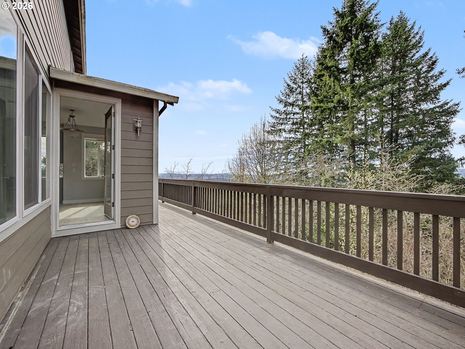12410 Southwest Aspen Ridge Drive Tigard, OR 97224 - Photo 19 of 47 a view of backyard with deck and wooden floor