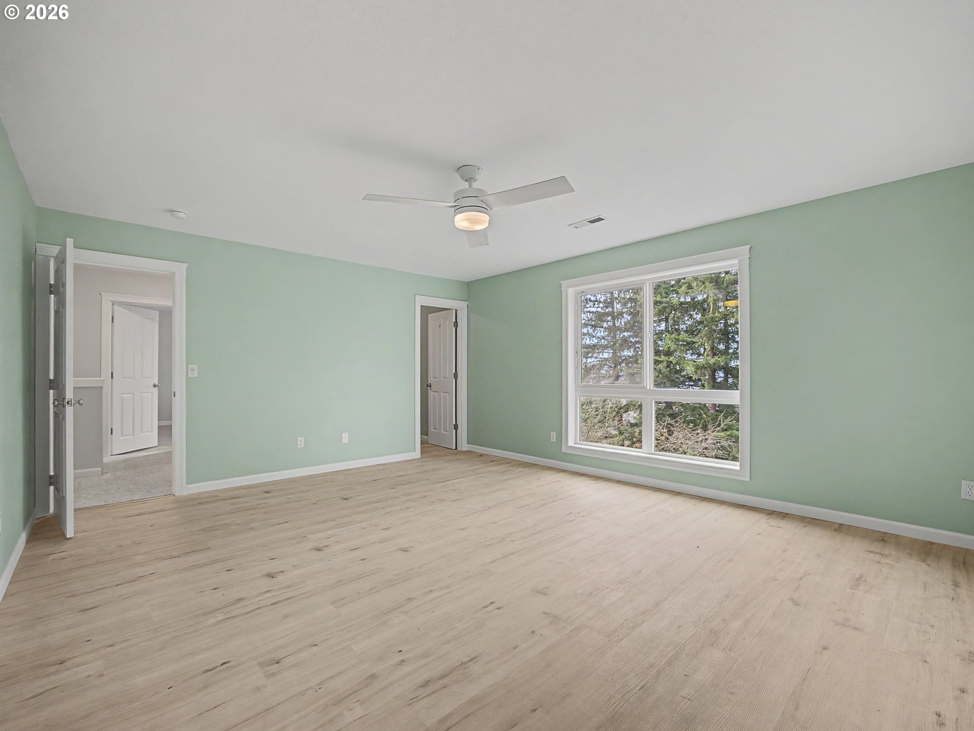 12410 Southwest Aspen Ridge Drive Tigard, OR 97224 - Photo 22 of 47 a view of an empty room with a window