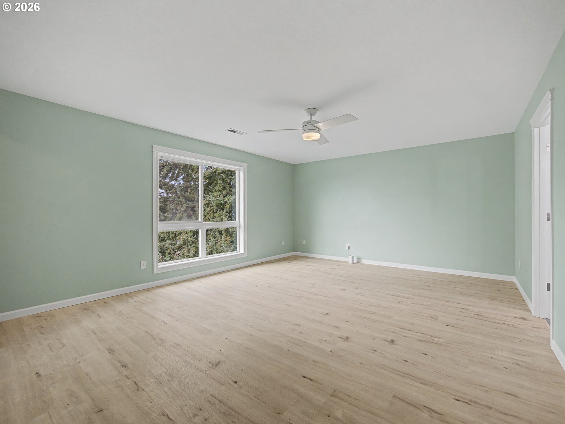 12410 Southwest Aspen Ridge Drive Tigard, OR 97224 - Photo 23 of 47 a view of an empty room with a window