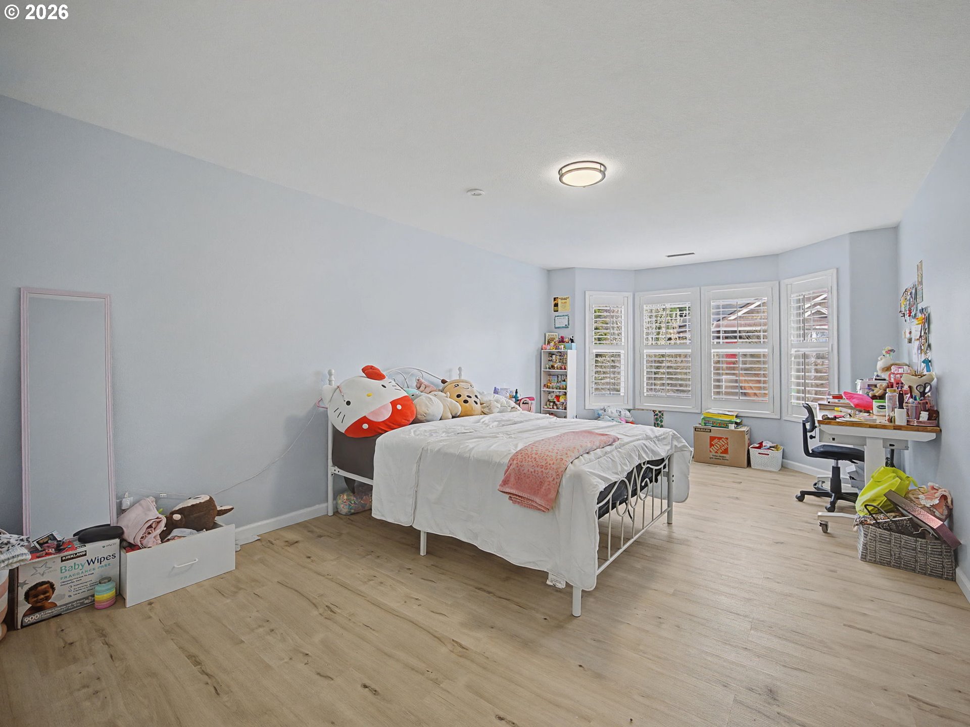 12410 Southwest Aspen Ridge Drive Tigard, OR 97224 - Photo 29 of 47 a bedroom with a bed and a table