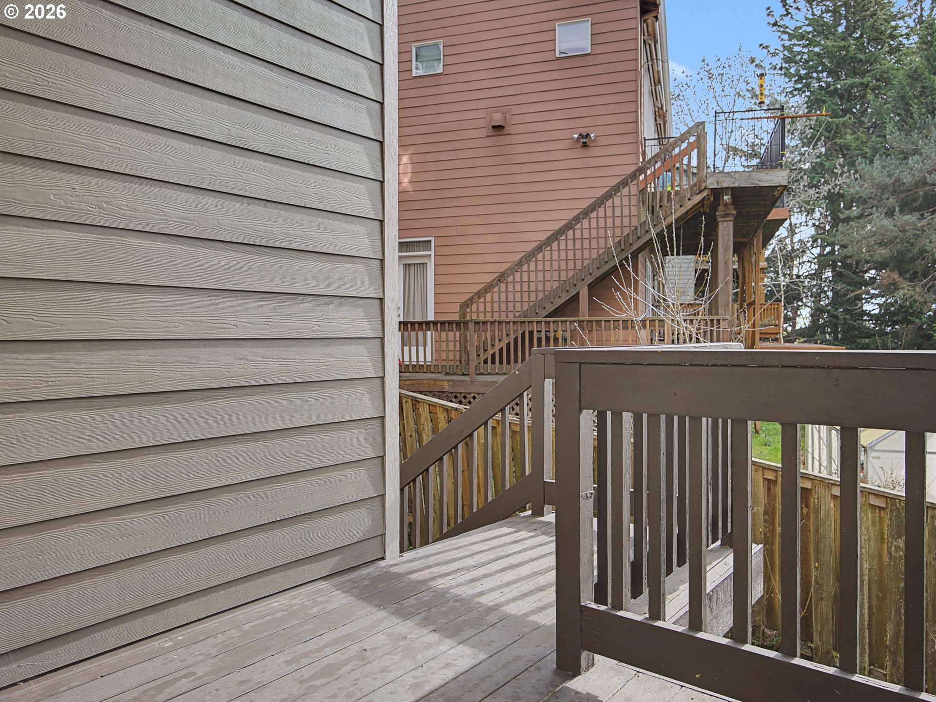 12410 Southwest Aspen Ridge Drive Tigard, OR 97224 - Photo 42 of 47 a view of a house with a deck