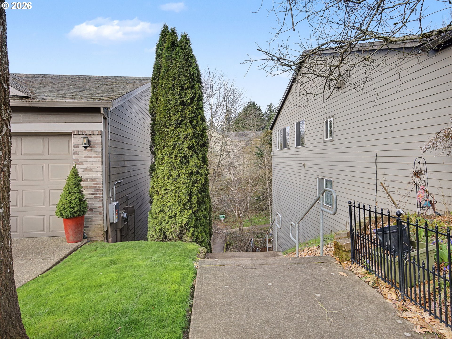12410 Southwest Aspen Ridge Drive Tigard, OR 97224 - Photo 46 of 47 a view of a house with a yard
