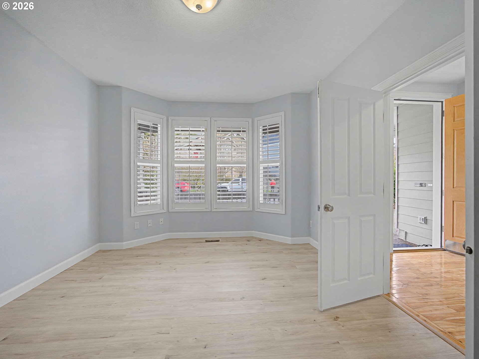 12410 Southwest Aspen Ridge Drive Tigard, OR 97224 - Photo 6 of 47 a view of an empty room with a window