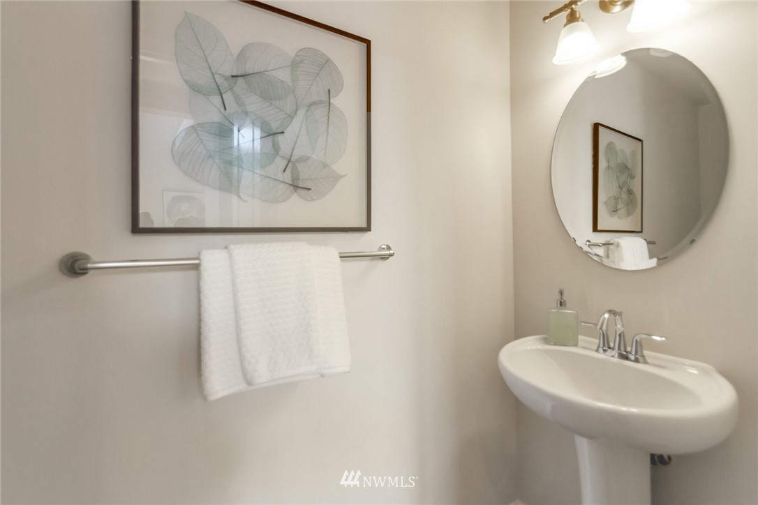 18615 35th Drive Southeast Bothell, WA 98012 - Photo 14 of 30 a bathroom with a sink and a mirror