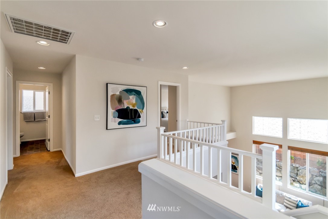 18615 35th Drive Southeast Bothell, WA 98012 - Photo 17 of 30 a view of a hallway with windows