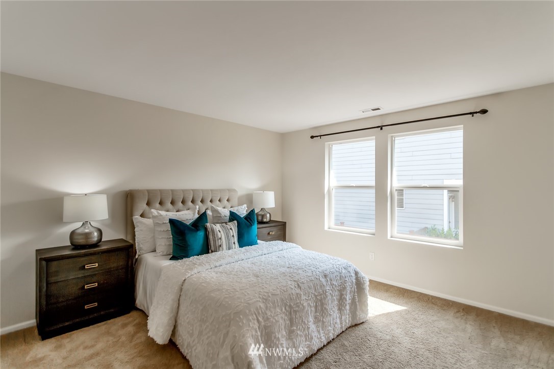 18615 35th Drive Southeast Bothell, WA 98012 - Photo 18 of 30 a bedroom with a bed and a window