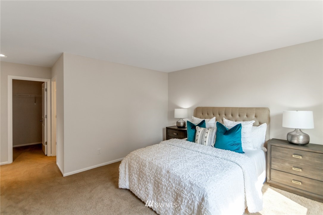 18615 35th Drive Southeast Bothell, WA 98012 - Photo 20 of 30 a bedroom with a bed and a lamp