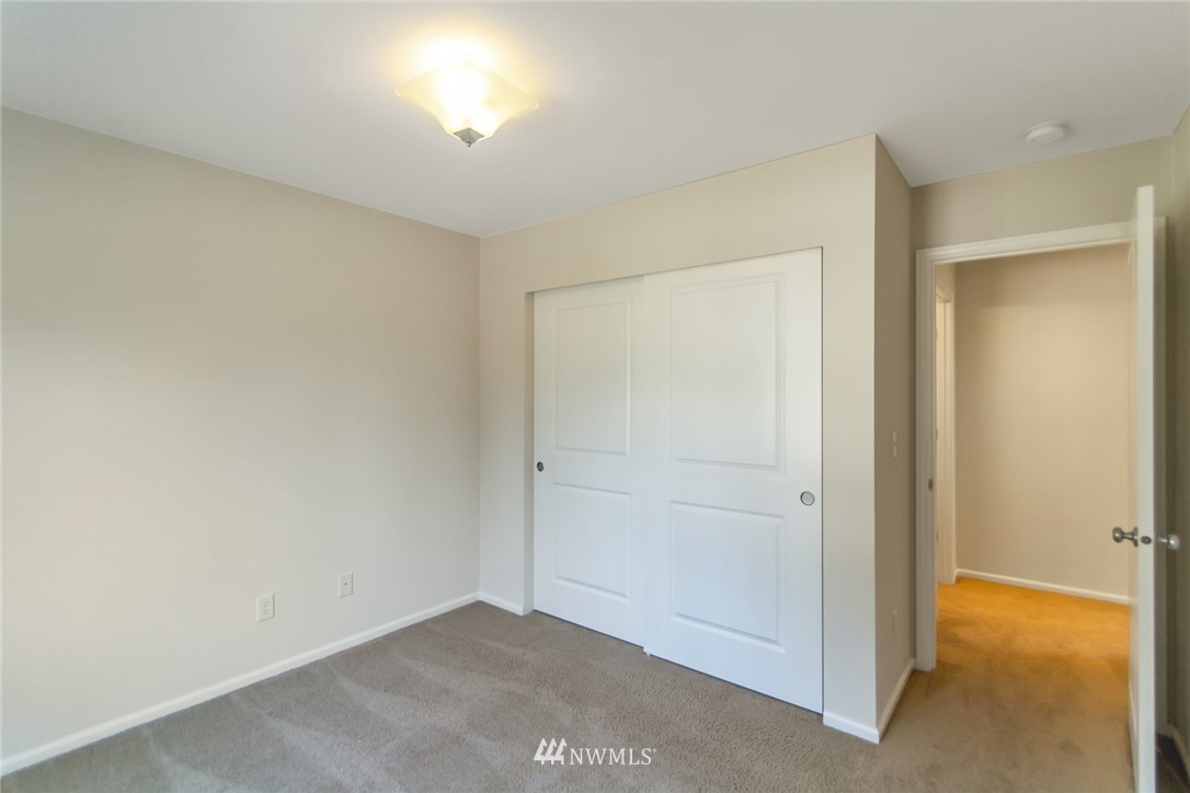 18615 35th Drive Southeast Bothell, WA 98012 - Photo 24 of 30 an empty room with windows and closet
