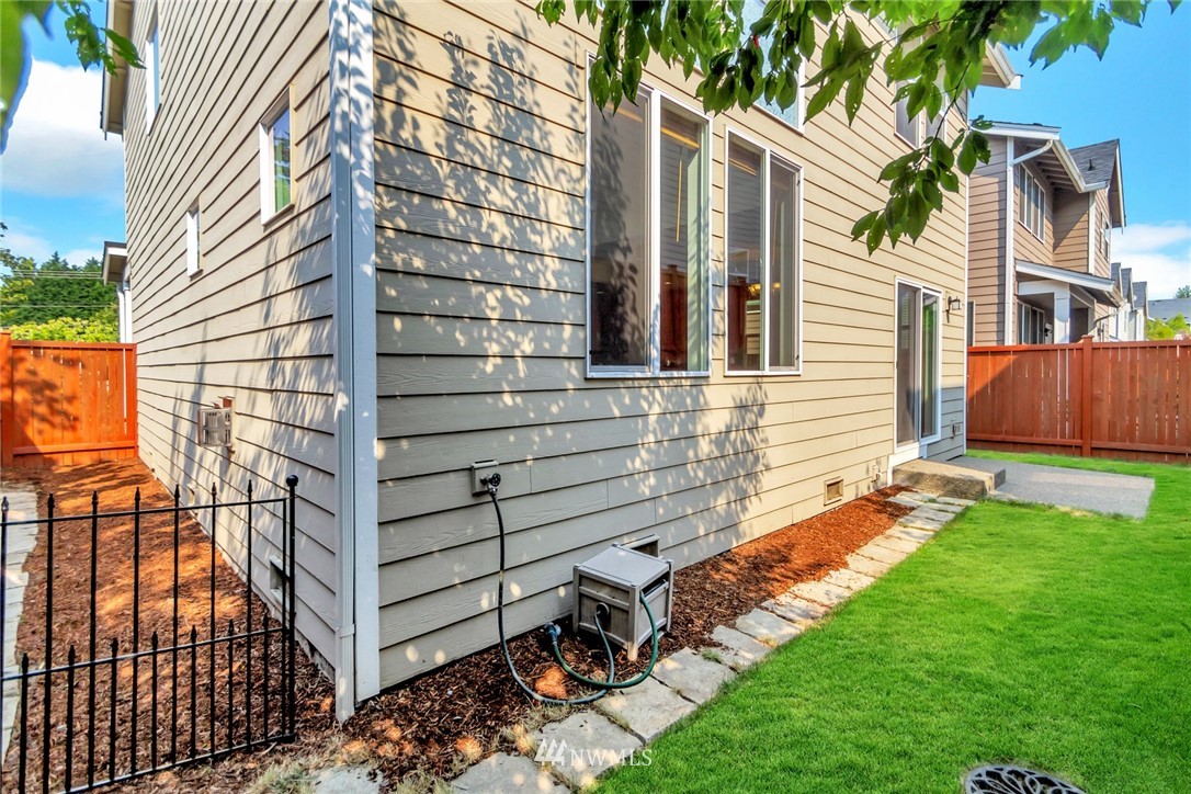 18615 35th Drive Southeast Bothell, WA 98012 - Photo 28 of 30 front view of a house with a yard