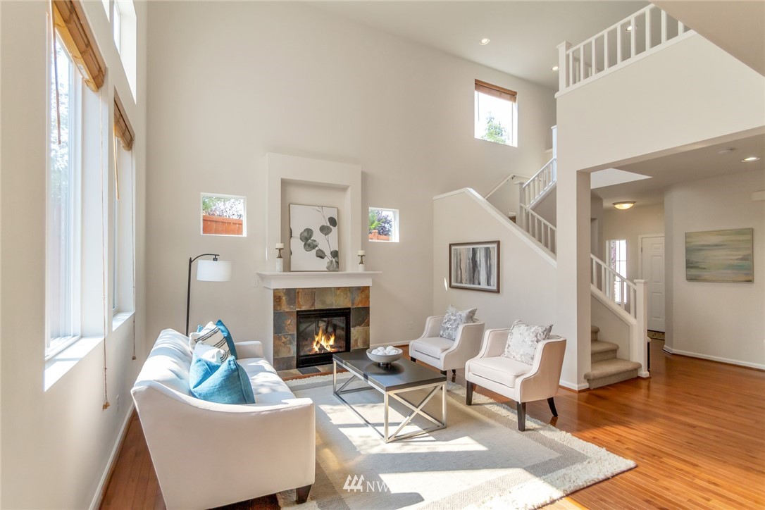 18615 35th Drive Southeast Bothell, WA 98012 - Photo 4 of 30 a living room with furniture and a fireplace
