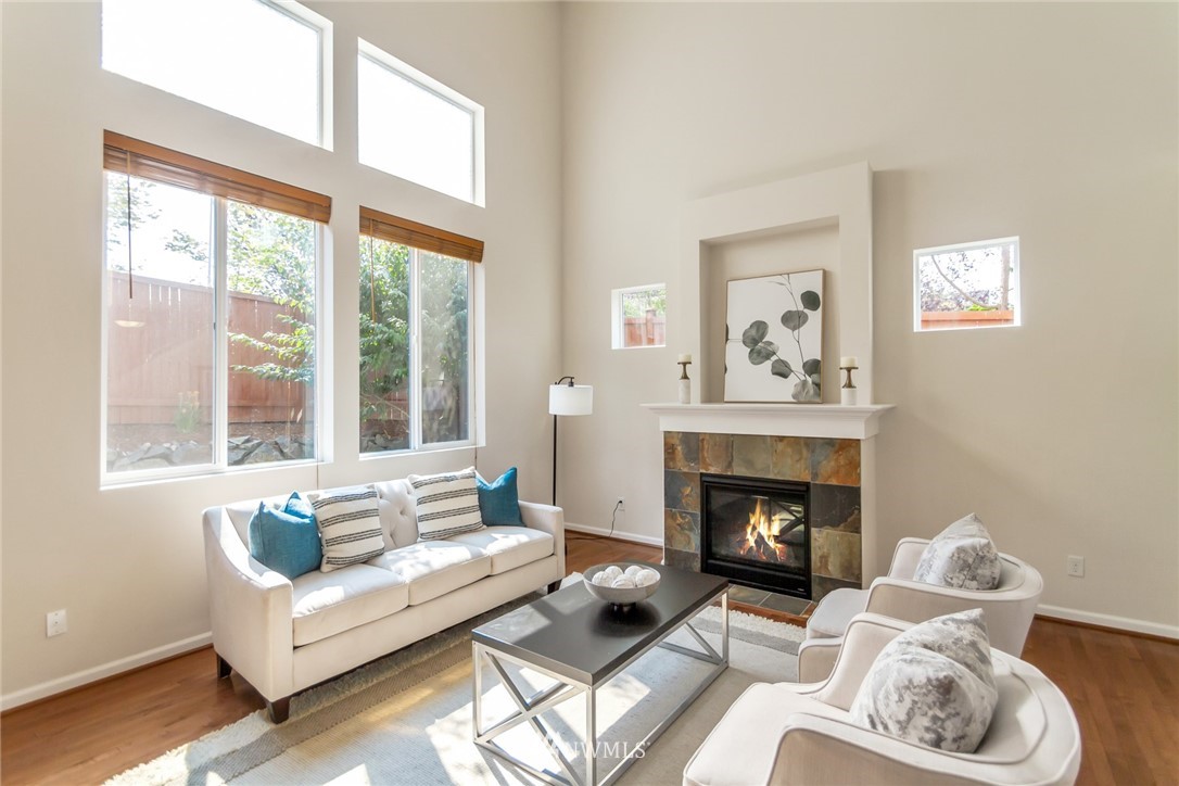 18615 35th Drive Southeast Bothell, WA 98012 - Photo 5 of 30 a living room with furniture and a fireplace