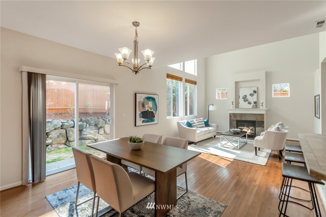 18615 35th Drive Southeast Bothell, WA 98012 - Photo 6 of 30 a view of a dining room with furniture window and wooden floor