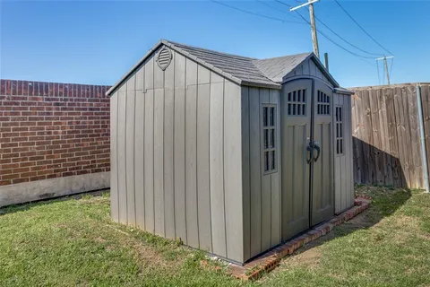 a house view with a backyard space