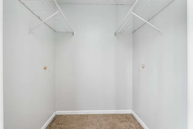 a view of small space with racks on the wall